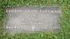 Eugene John Fangmans gravsten på Calvary Cemetery i Freeport, Illinois